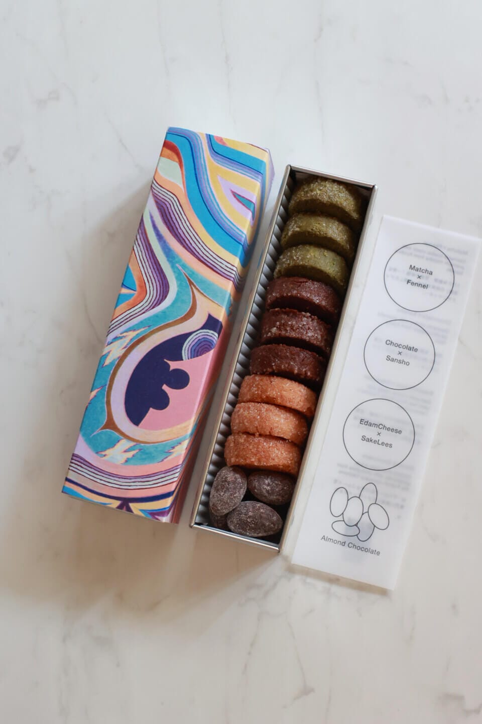 【OEM・商品開発】アート滞在型ホテル BnA Alter Museumのウェルカムスイーツ・クッキー缶を制作いたしました